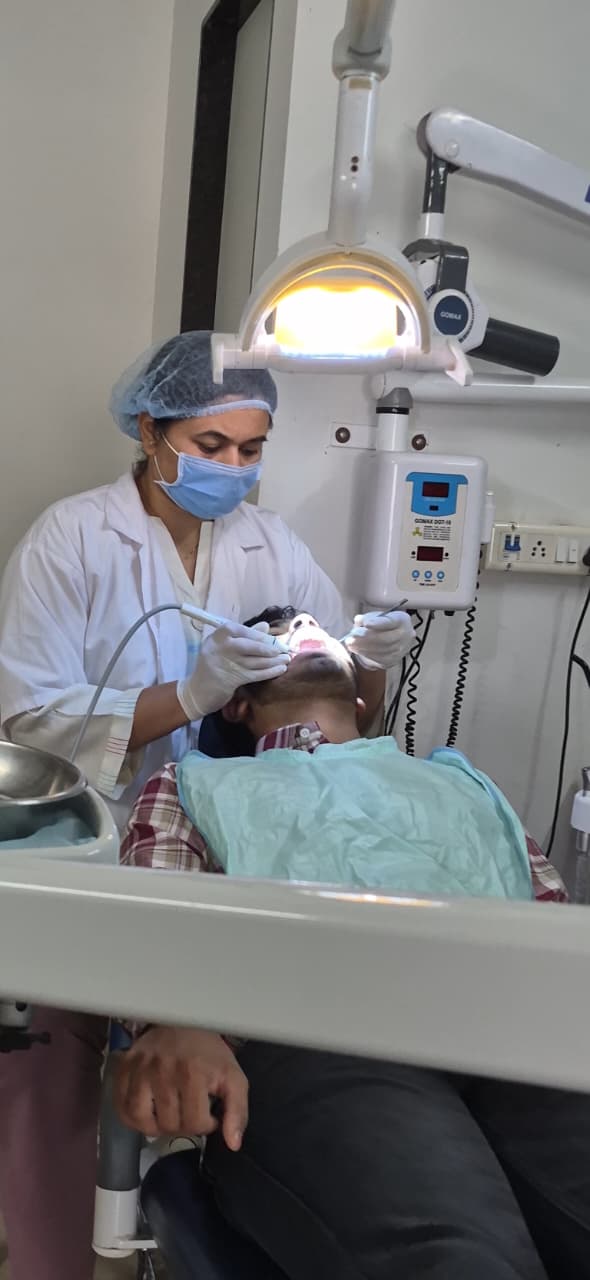 Gentle dental treatment in progress at Sudant Dental Clinic, Rajkot
